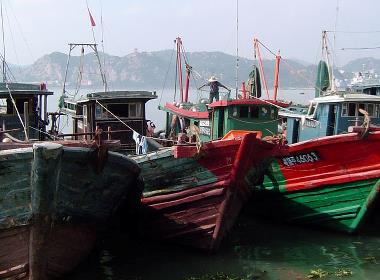 Fiskebåtar i en av Kinas kuststäder (båtarna på bilden har ingen koppling till texten).